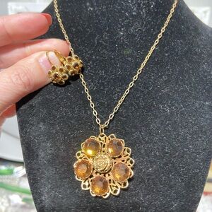 Gold Tone Pendant Necklace With Brown Rhinestones and Coordinating Earrings